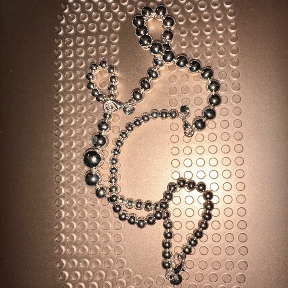two graduated ball necklaces silvertone